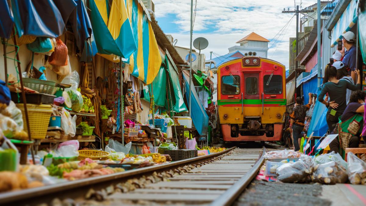 Damnoen Saduak Floating Market Maeklong Train Market Tour