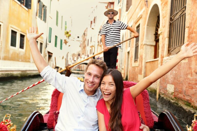 a man and woman in a gondola