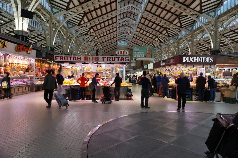 Food Stalls Under The Iron And Glass Roof Of The Central Market In Valencia