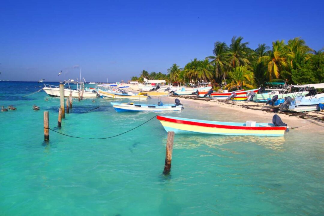 how to get from isla mujeres to cancun airport