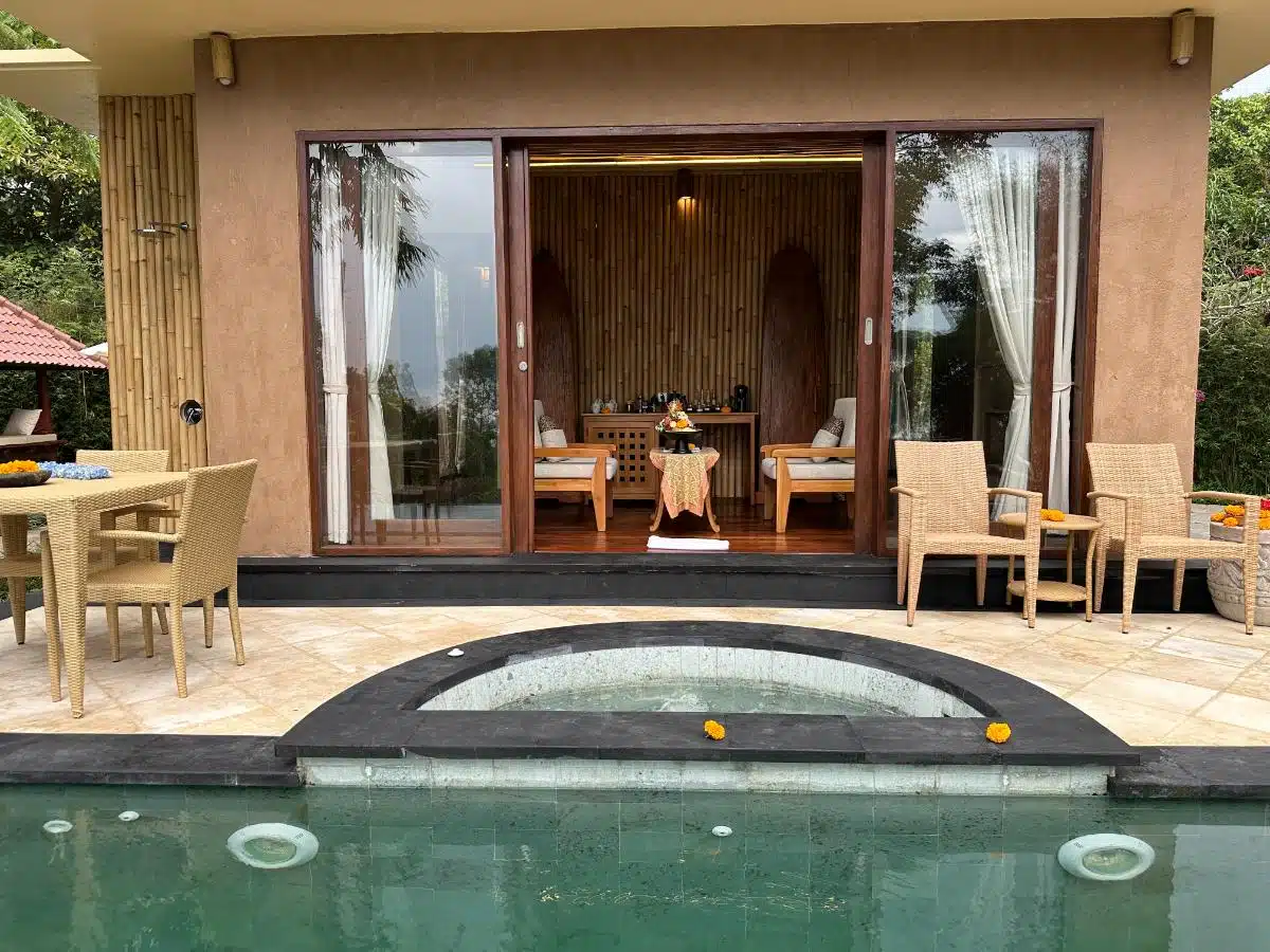 Lush Tropical Sun Deck With Outdoor Shower And Wooden Railings At A Pool Villa In Munduk Moding Plantation, Bali Highlands