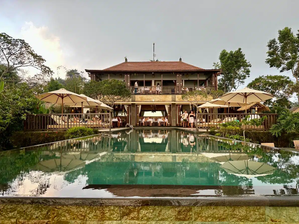 Sun Loungers And Wooden Deck At The Lower Infinity Pool Overlooking The Rainforest At Munduk Moding Plantation, Munduk, Bali