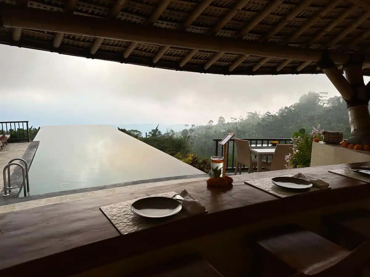 Cozy Sunset Bar Interior With Rattan Furniture And Panoramic Jungle Views At Munduk Moding Plantation, Bali Highlands