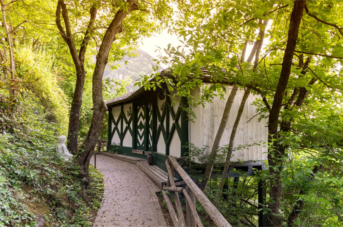 Castellum Spa Arbor House With Bavarian White And Green Timber Framing Nestled In The Woodland Grounds Of Castel Fragsburg In Merano