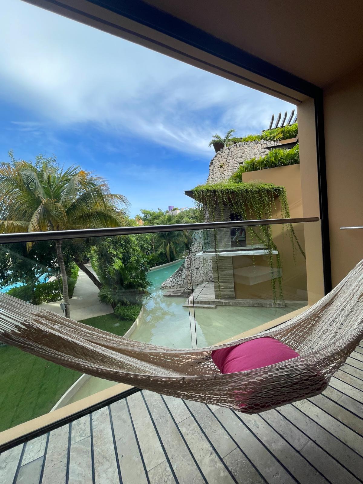 Balcony Hammock With River View Suite Overlooking The Jungle River And Tropical Gardens At Xcaret Arte All-Inclusive Resort Near Playa Del Carmen